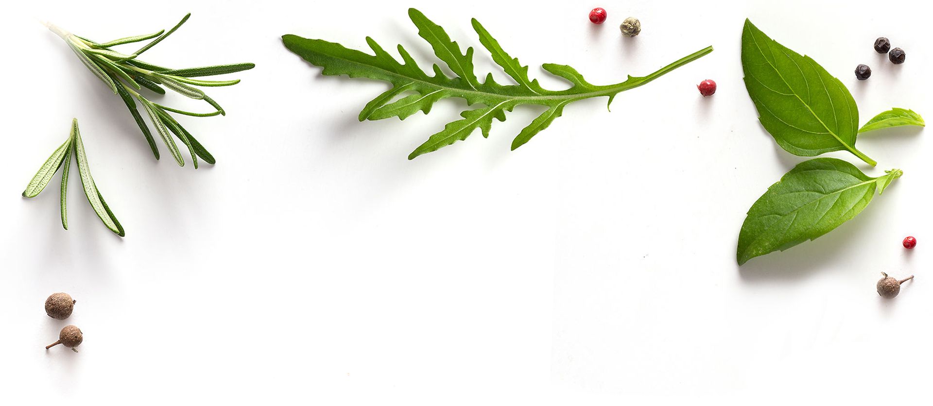 Different herbs and pepper